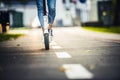 Close up details of electric scooter on the road. Ecological and urban transport in the city. Royalty Free Stock Photo