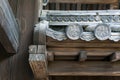 Close up details of Hanagawara or roof tile ornamentation with floral and plant designs in traditional Japanese architecture