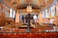 Close-up details of holy cross and wedding crowns from church