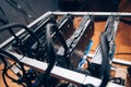 Close up details of mining rig, crypto currency modern technology. Power cables going into gpu graphics cards Royalty Free Stock Photo