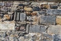 Close up details pattern of background texture of stone brick wall on ancient fortress building from medieval architecture Royalty Free Stock Photo