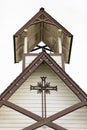 Close up details of a steeple of a wooden white church in old town in BC. Top of the rural church Royalty Free Stock Photo