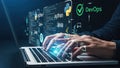 Developer working on laptop with programming languages and DevOps concepts Royalty Free Stock Photo