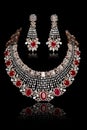 Close up of diamond necklace set on with diamond earring isolated on black Royalty Free Stock Photo