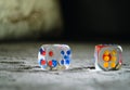 Close-up of dice made of transparent plastic