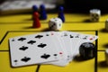 Close up of dices and cards on yellow game board