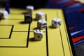 Close up of dices on yellow game board