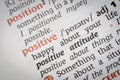 Close-up of the dictionary word positive