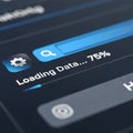 Close-up of a digital interface displaying a data loading process at 75% Royalty Free Stock Photo