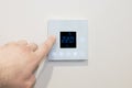 Close-up of a digital thermostat being adjusted Royalty Free Stock Photo