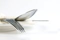 Close up dinning silverware fork , spoon and knife with dish on Royalty Free Stock Photo
