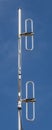 Close up dipole antenna for telecommunications with clear blue s