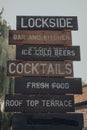 Close up of directional wooden signs inside Camden Market, London, UK Royalty Free Stock Photo