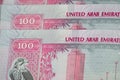 Close-up of 100 dirhams banknotes, the official currency of the United Arab Emirates.