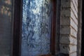 Close up of a dirty broken boarded up window sill on an abandoned building Royalty Free Stock Photo