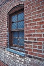 Close up of a dirty broken boarded up window sill on an abandoned building Royalty Free Stock Photo