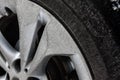 Close up of dirty car alloy wheels. Royalty Free Stock Photo