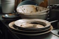 Close-up of dirty dishes in the sink in the kitchen