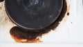 Close-up of a dirty stove with leftover food. Dirty gas stove with grease stains, old grease stains, fried stains and oil splashes Royalty Free Stock Photo