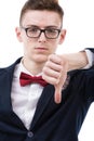 Close-up of a disappointed young business man showing thumb down Royalty Free Stock Photo