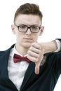 Close-up of a disappointed young business man showing thumb down Royalty Free Stock Photo