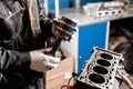 Close-up of the disassembled engine on the stand. New cylinders. Motor capital repair. Sixteen valves and four cylinder Royalty Free Stock Photo