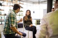 Close-up on discussion. Close-up of people communicating while sitting in circle and gesturing Royalty Free Stock Photo