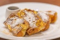 Close up on dish plate with french toasts also known as eggy bread.