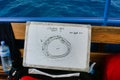 Closeup of a dive briefing table, diving spot near Maafushi Island Maldives