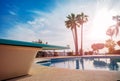 Close-up of a diving board for swimming pool with sunset light Royalty Free Stock Photo