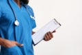 Close up of doc in blue uniform holding medical folder Royalty Free Stock Photo