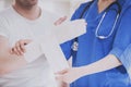 Close up. Doctor Comforting Hand Inury of Patient. Royalty Free Stock Photo