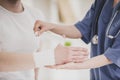 Close up. Doctor Comforting Hand Inury of Patient. Royalty Free Stock Photo
