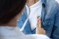 Close-up of doctor checking patient`s vitals at a hospital