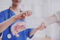 Close up. Doctor Comforting Hand Inury of Patient. Royalty Free Stock Photo