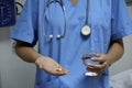 Close-up of a doctor giving pills to a patient. Royalty Free Stock Photo