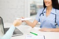 Close up of doctor giving prescription to patient Royalty Free Stock Photo