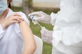 Close up doctor holding syringe and using cotton before make injection. Covid-19 or coronavirus vaccine Royalty Free Stock Photo