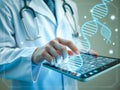 Close up of doctor holding tablet pc with dna molecule on screen Royalty Free Stock Photo