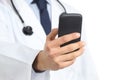 Close up of a doctor man hand holding and using a smart phone