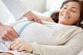 Close up of doctor and pregnant woman at hospital Royalty Free Stock Photo