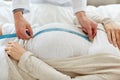 Close up of doctor and pregnant woman at hospital Royalty Free Stock Photo