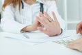 Close-up of doctor`s hands refusing a bribe. Royalty Free Stock Photo