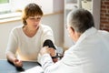 Doctor Taking Blood Sample Royalty Free Stock Photo