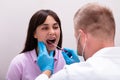 Close-up Of A Doctor Taking Saliva Sample For DNA Test Royalty Free Stock Photo