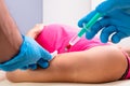 Young Pregnant Woman Receiving Vaccination In Clinic Royalty Free Stock Photo