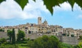 CLOSE UP: Beautiful shot of an old medieval town surrounded by a stone wall. Royalty Free Stock Photo