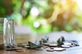 Close up dollar boat and coins Royalty Free Stock Photo