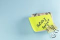 Close up dollars cash money in clip with text written note Holiday budget , concept of financial planning of set budget for Royalty Free Stock Photo