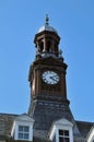 Close up of the dome and clock tower of leeds city hall in west yorkshire against a blue sky Royalty Free Stock Photo